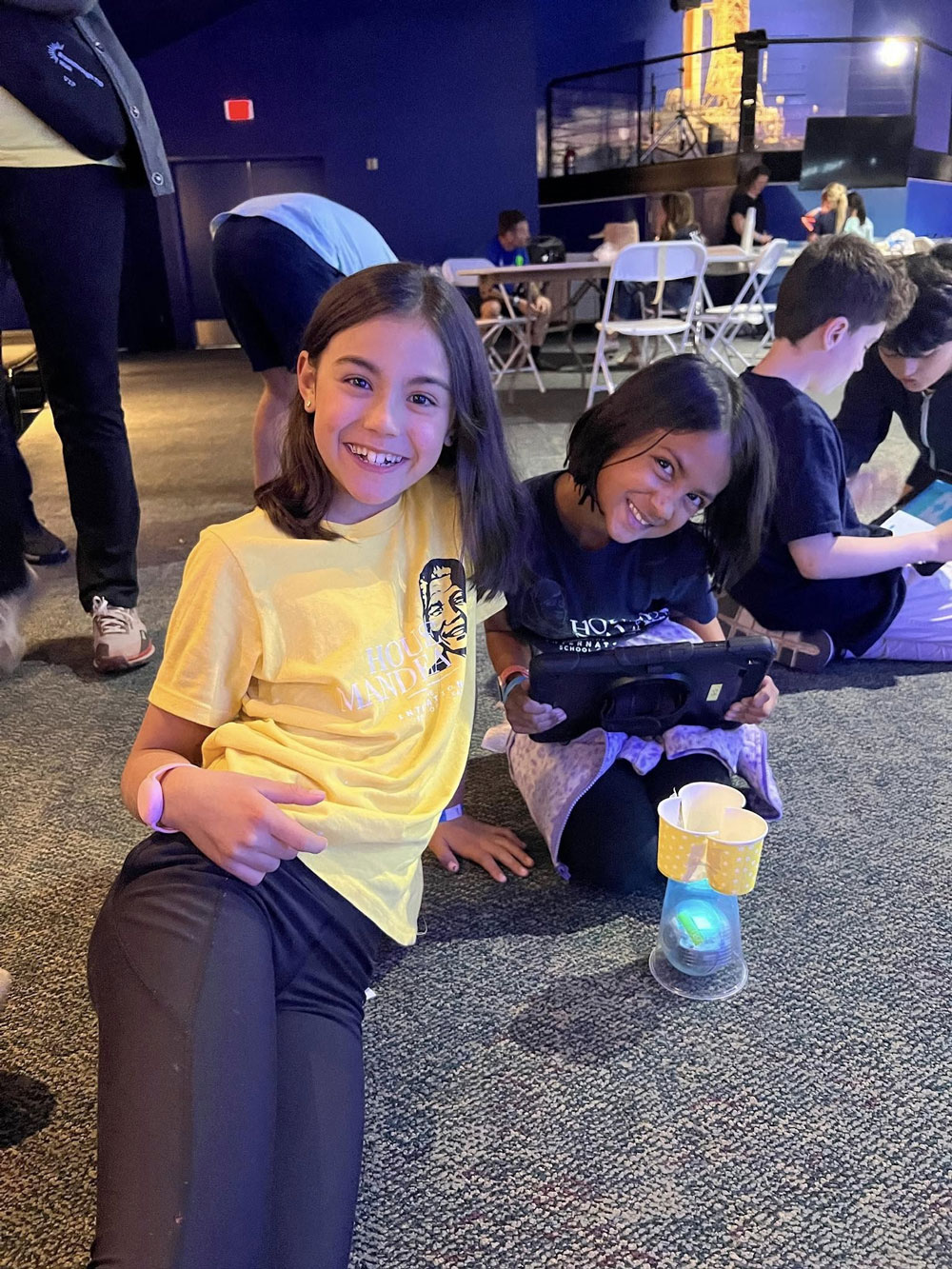International School of Texas students posing for a picture at a STEM science sleepover.